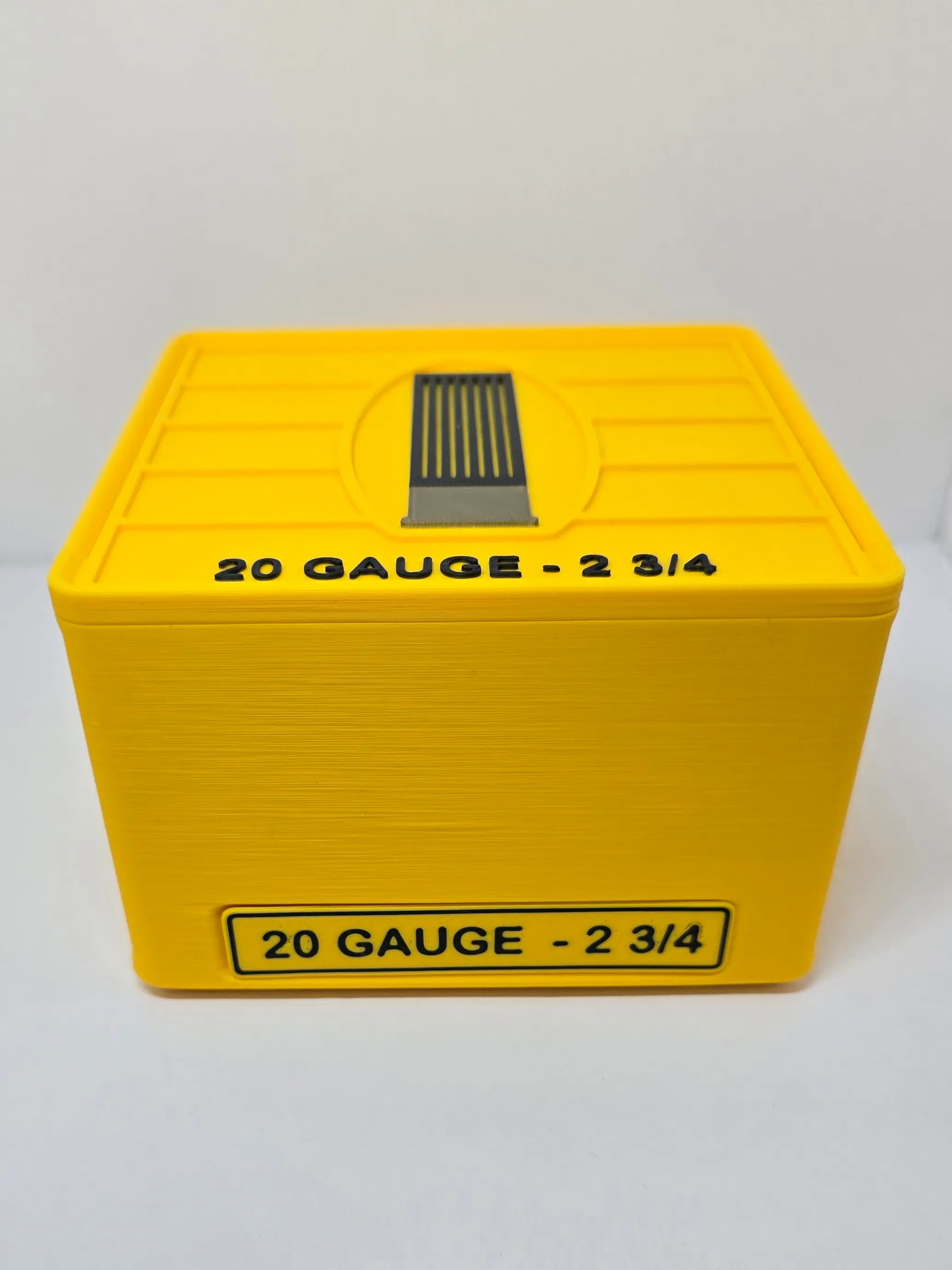 Front detail of Yellow 20 Gauge ForgeBox with Black text