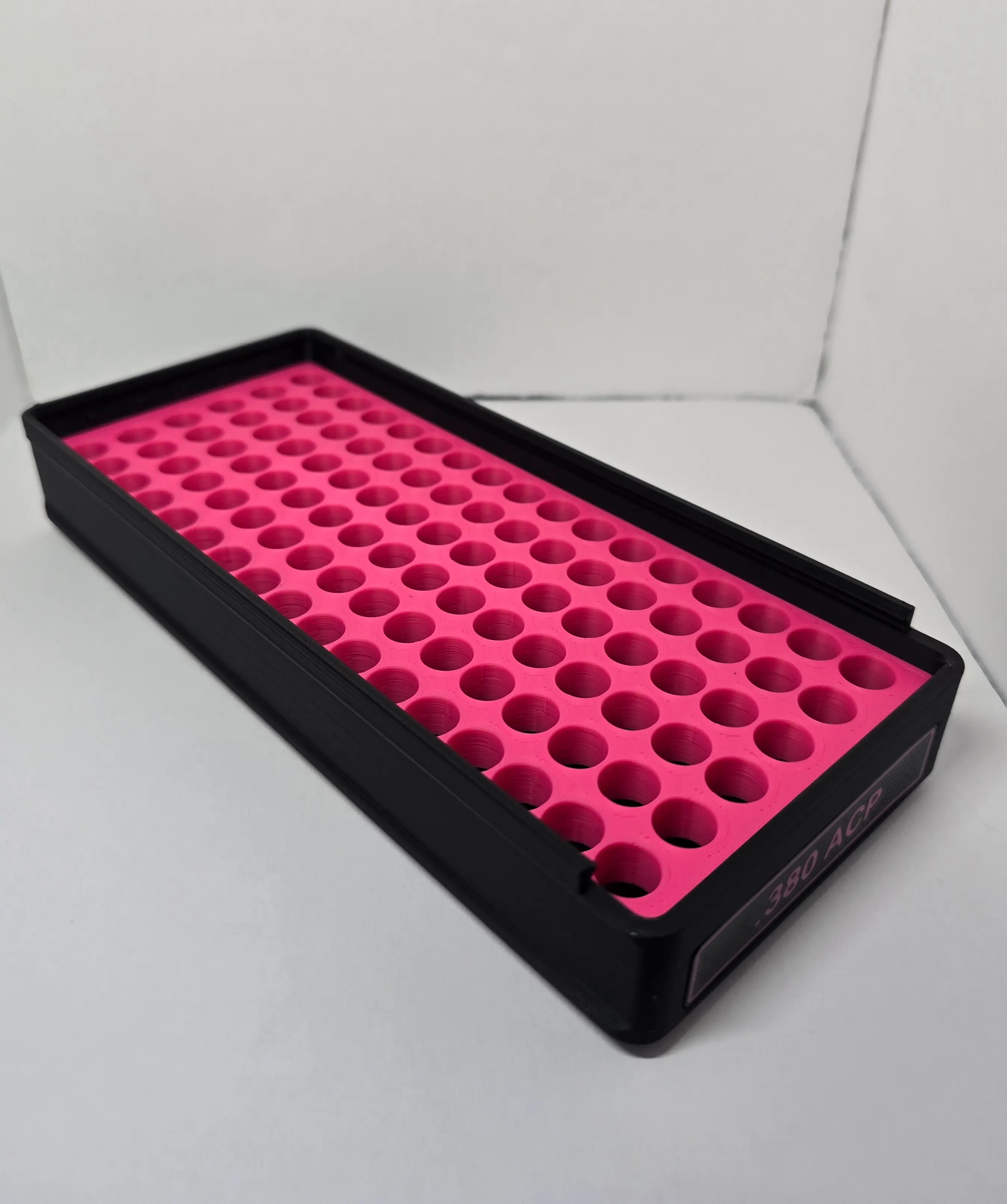 Open Black .380 ACP ForgeBox showing Hot Pink 102 round tray