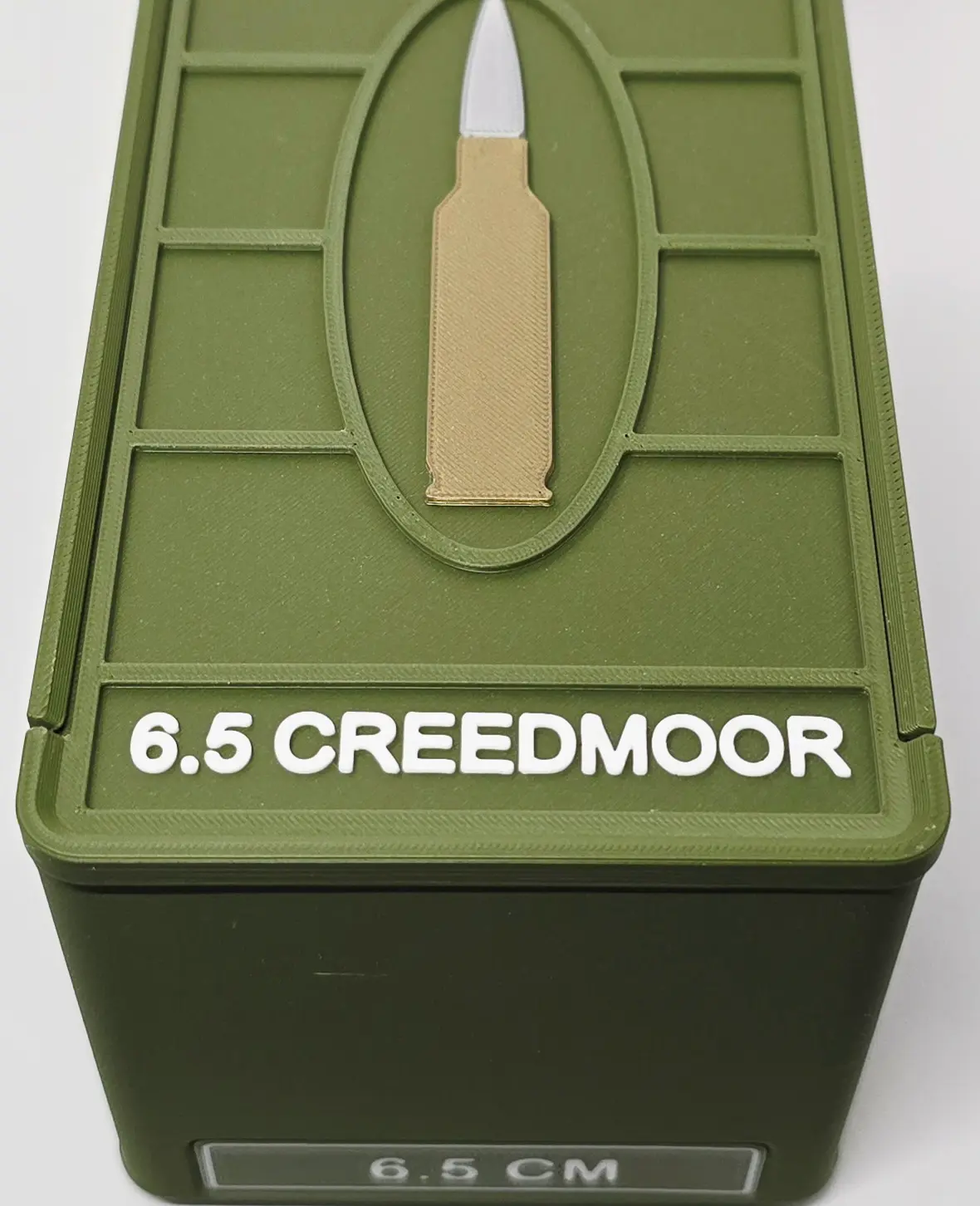 Front face view of custom 6.5 Creedmoor ForgeBox in Dark Green and White