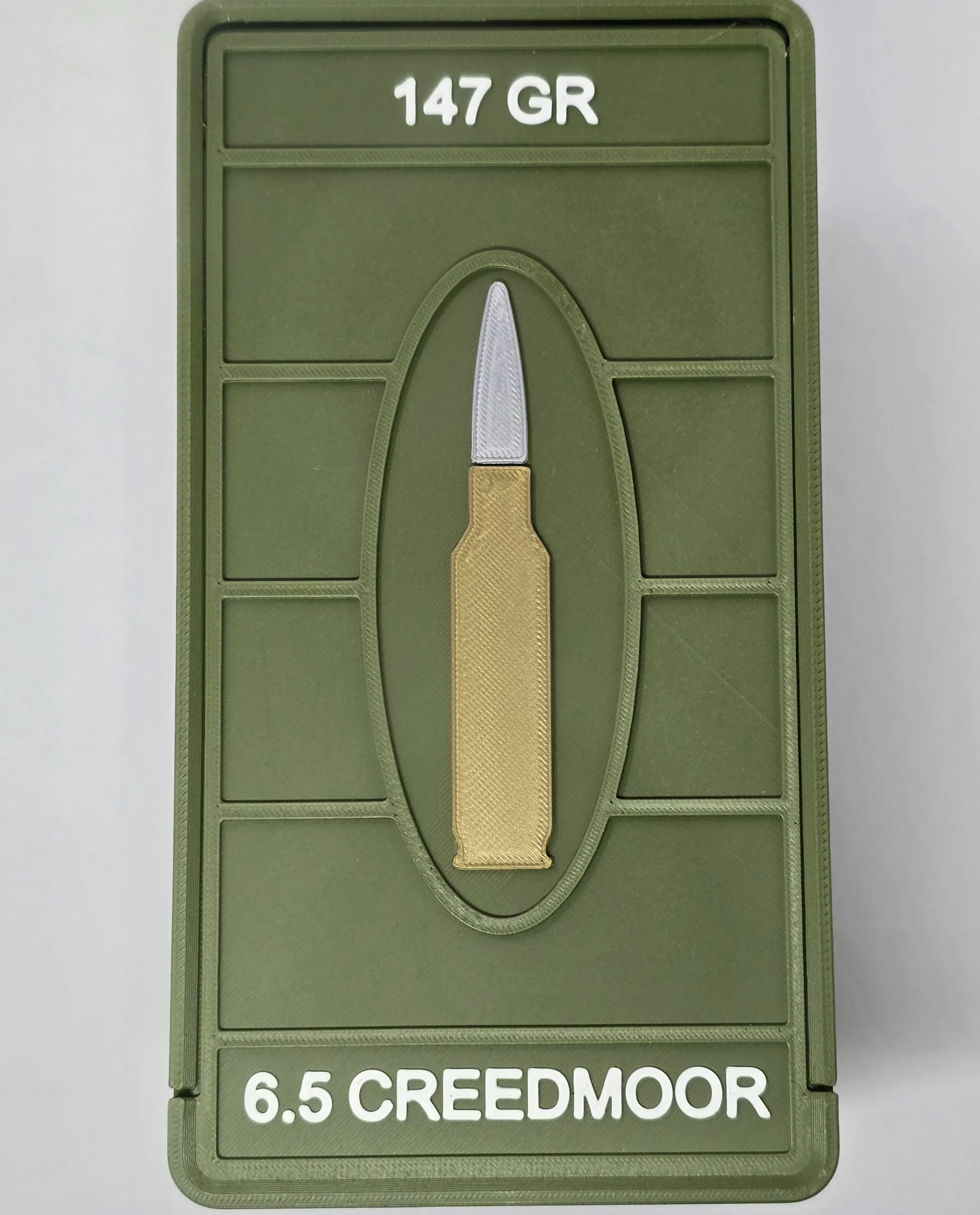 Top view of custom 6.5 Creedmoor ForgeBox with 147 GR text