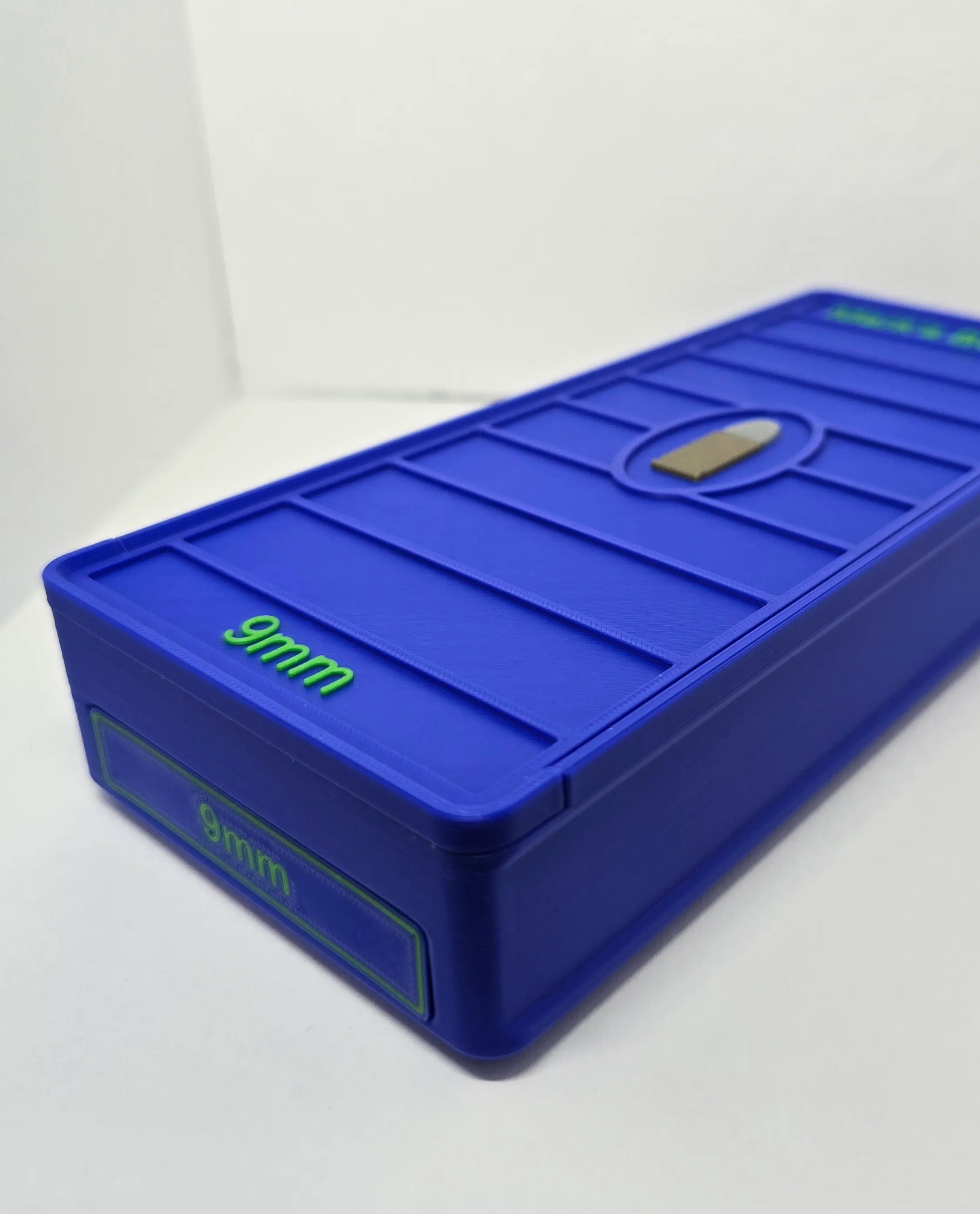 Angled front view of Blue and Green 9mm ForgeBox