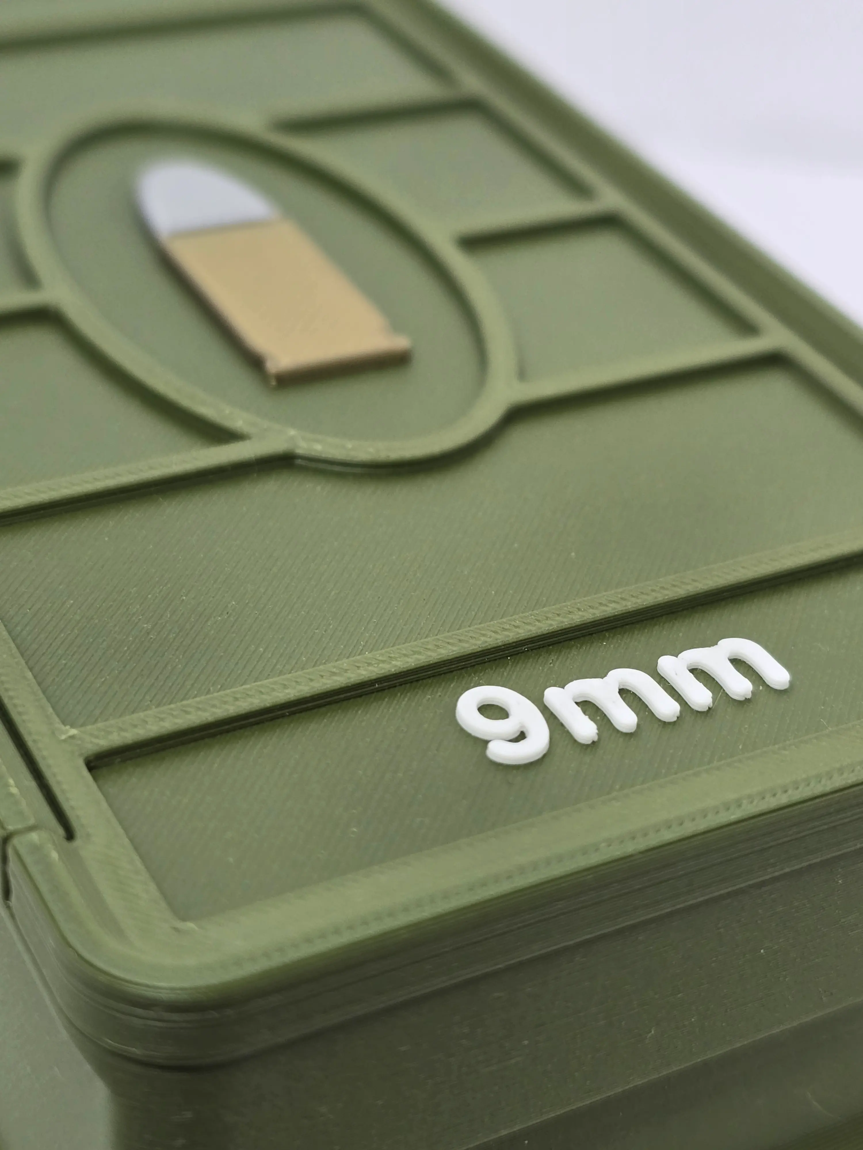 Macro lid detail of Dark Green 9mm ForgeBox