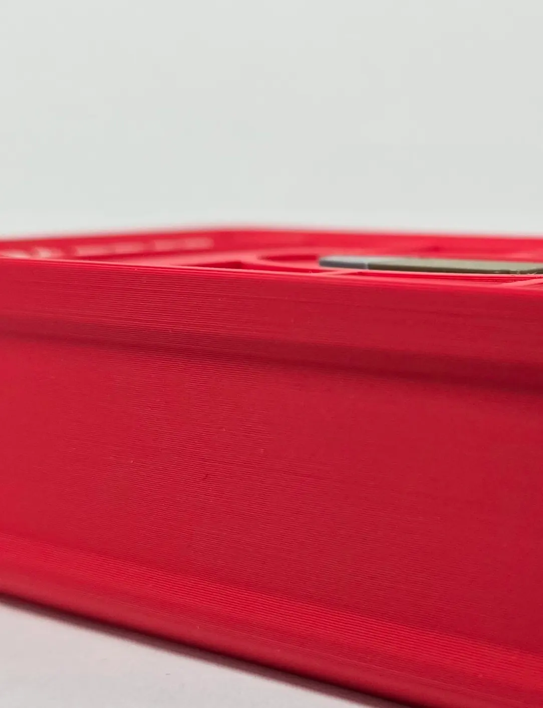 Side detail of custom Sinner 9mm ForgeBox showing Scarlet Red body
